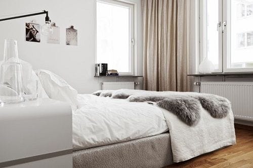 Dormitorio nórdico blanco y gris
