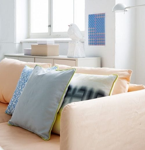 pajaro ceramica blanco sofa rosa