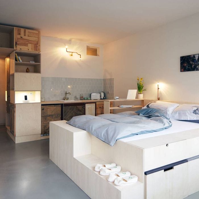 Dormitorio estudio materiales reciclados