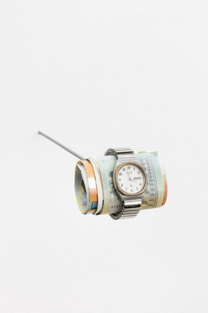 reloj fajo dinero