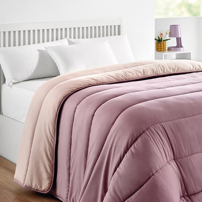 cama de dormitorio con nórdico rosa de Pikolín Home