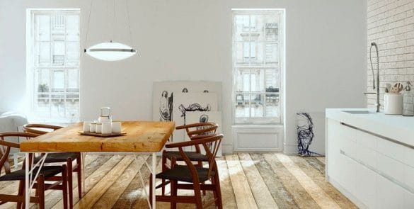cocina blanca abierta con mesa y sillas de madera
