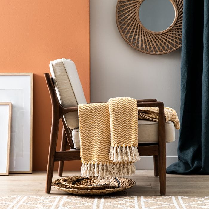 Sillón con una manta en fibras naturales Leroy Merlin