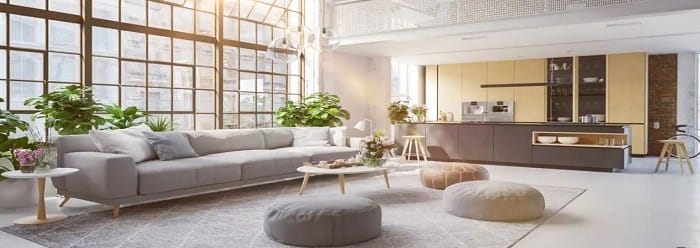 salón con cocina abierta con microcemento