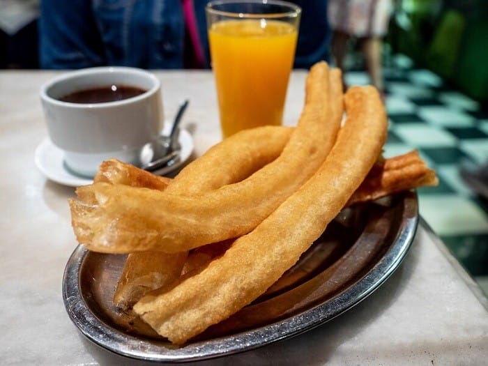 churros con chocolate y zumo de naranja