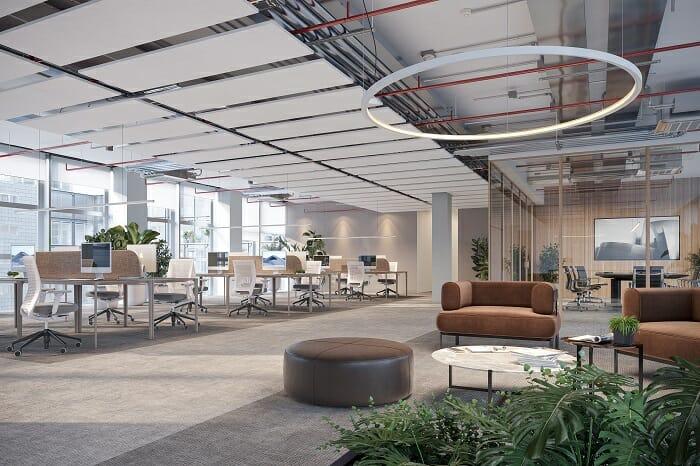 Diseño del interior de una oficina con mesas, sillas y sofás cómodos