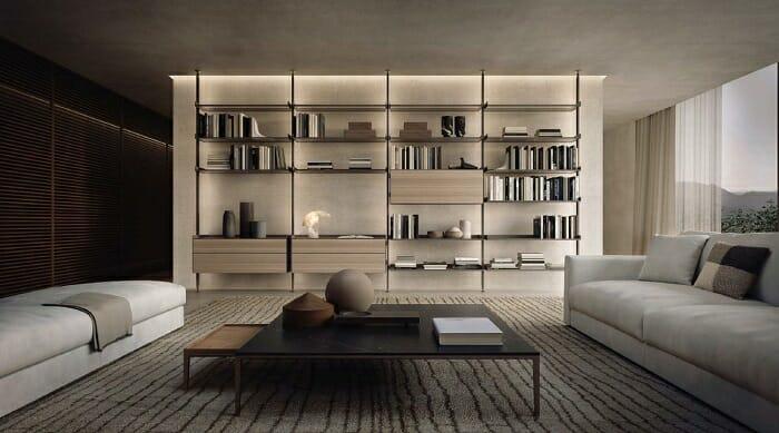 Salón con librería y dos sofás con mesa