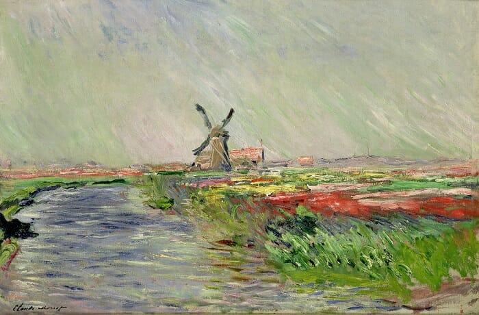 Cuadro famoso de Monet de un campo de tulipanes con un molino al fondo