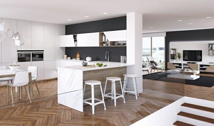 Cocina con isla con taburetes en tonos blancos y negros