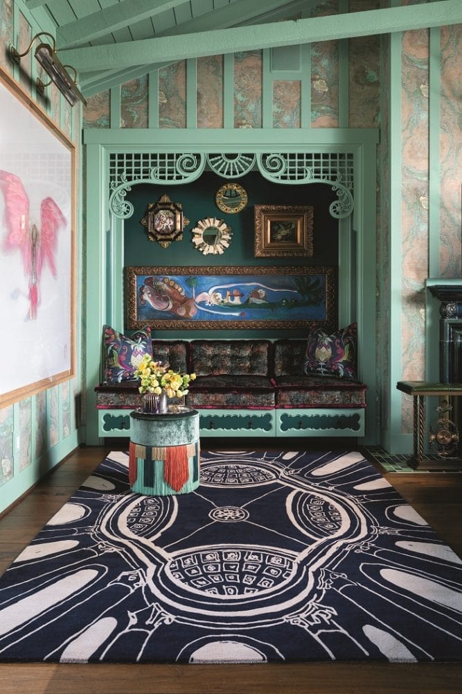 Zona de sofá con alfombra de diseño