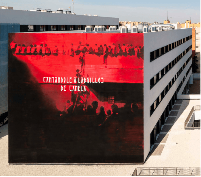 fachada lateral de niños tirándose al rio en Sevilla de Livensa Living Sevilla arte hecho por Alex Avoid