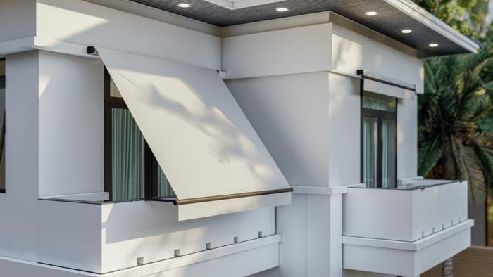 toldo estor color blanco en ventana abierta