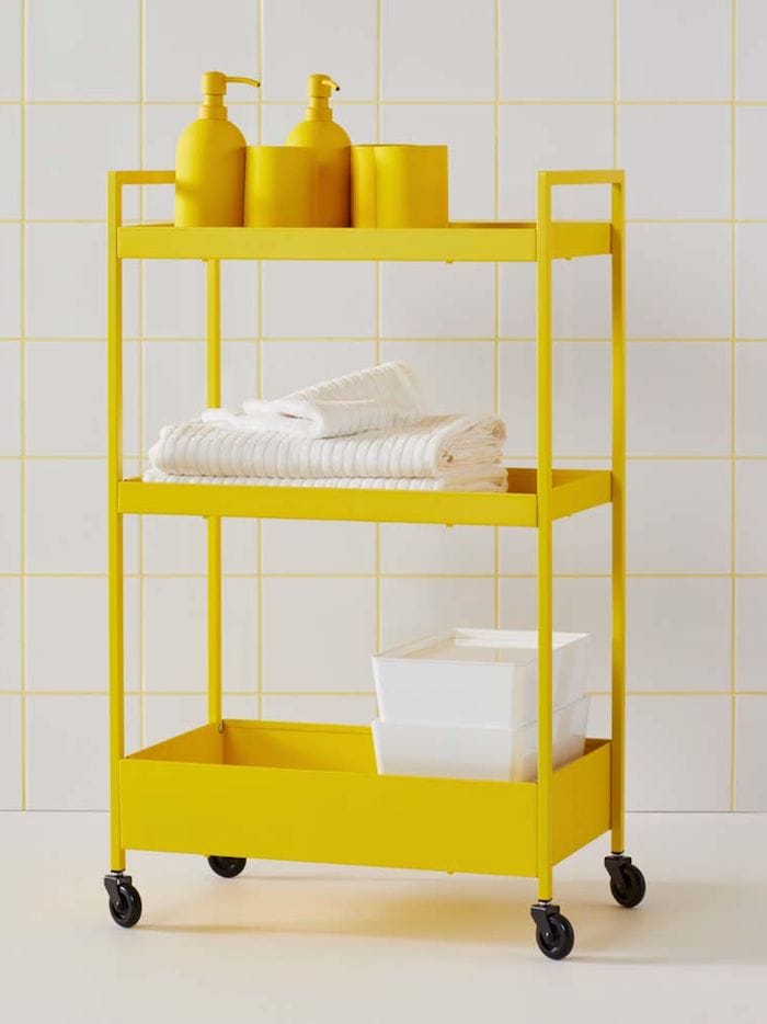 carro almacenaje ruedas amarillo metal
