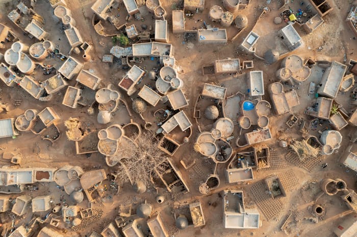 casas con polvo, fotografía hecho por Iwan Baan