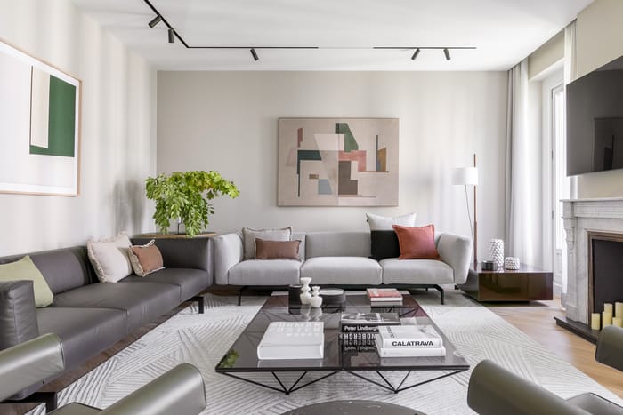 Salón moderno con sofás grises