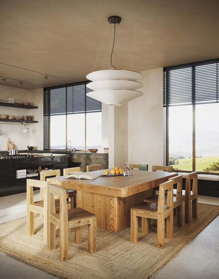 Salón luminoso con vistas al paisaje, cerámica Marazzi y diseño de Charlotte Taylor.